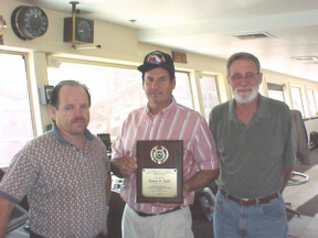 Cass Kane, Captain Elden W. Brege, and Richard Robertson